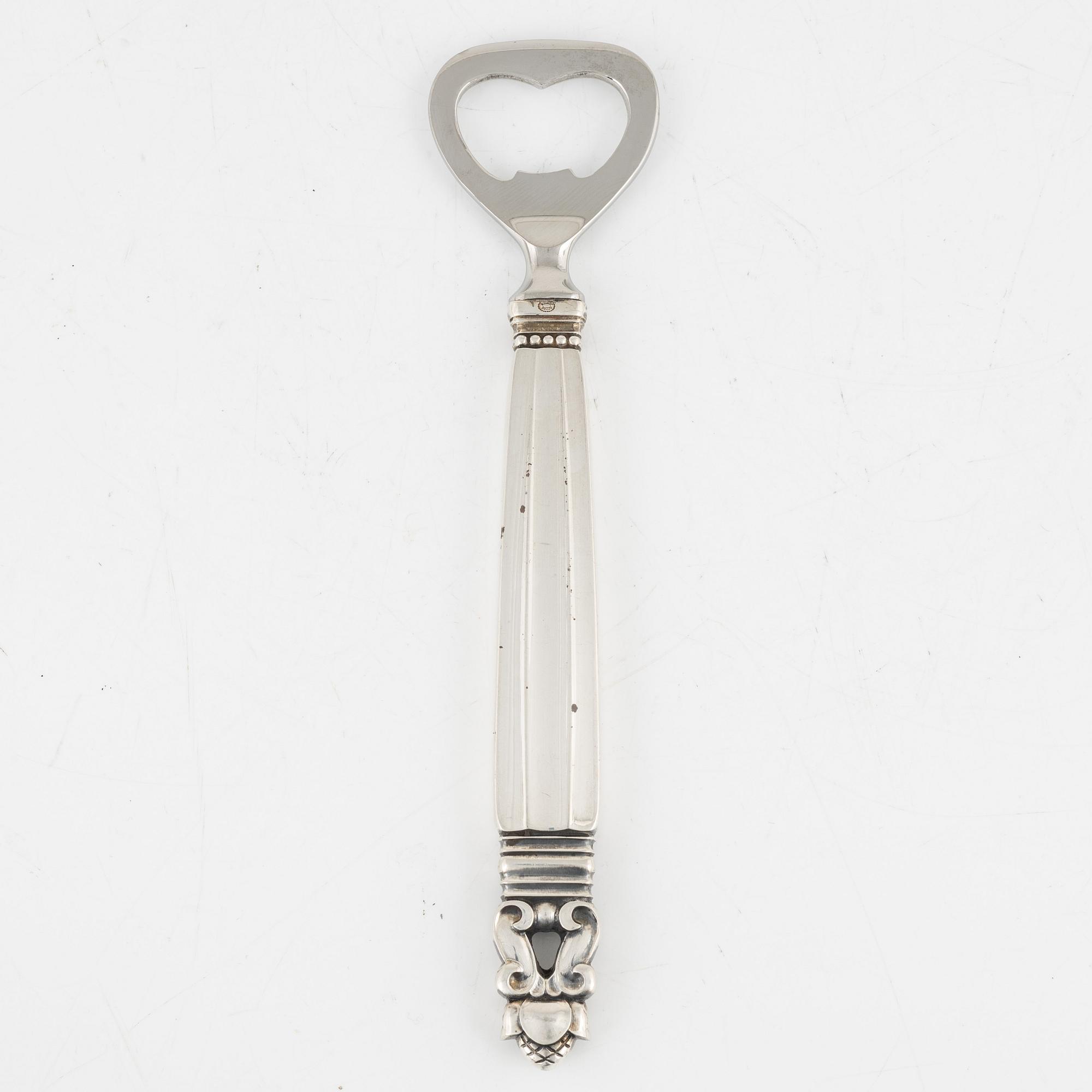 A sterlingsilver bottle opener, "Konge", Johan Rodhe for Georg Jensen.