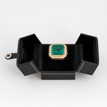 Large emerald-cut emerald and brilliant-cut diamond cocktail ring.