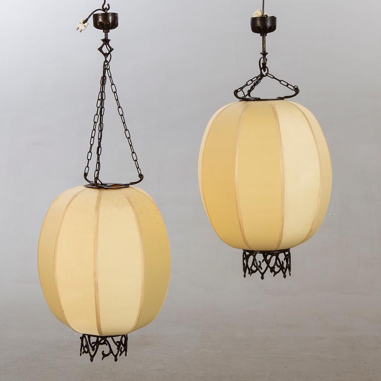 A pair of Chinese 20th century ceiling lamps.