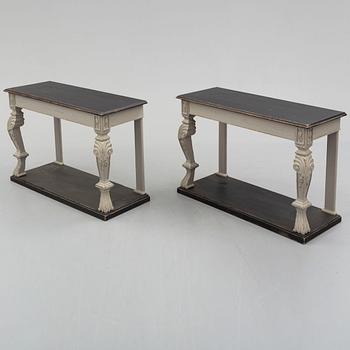 a pair of 20th century console tables.