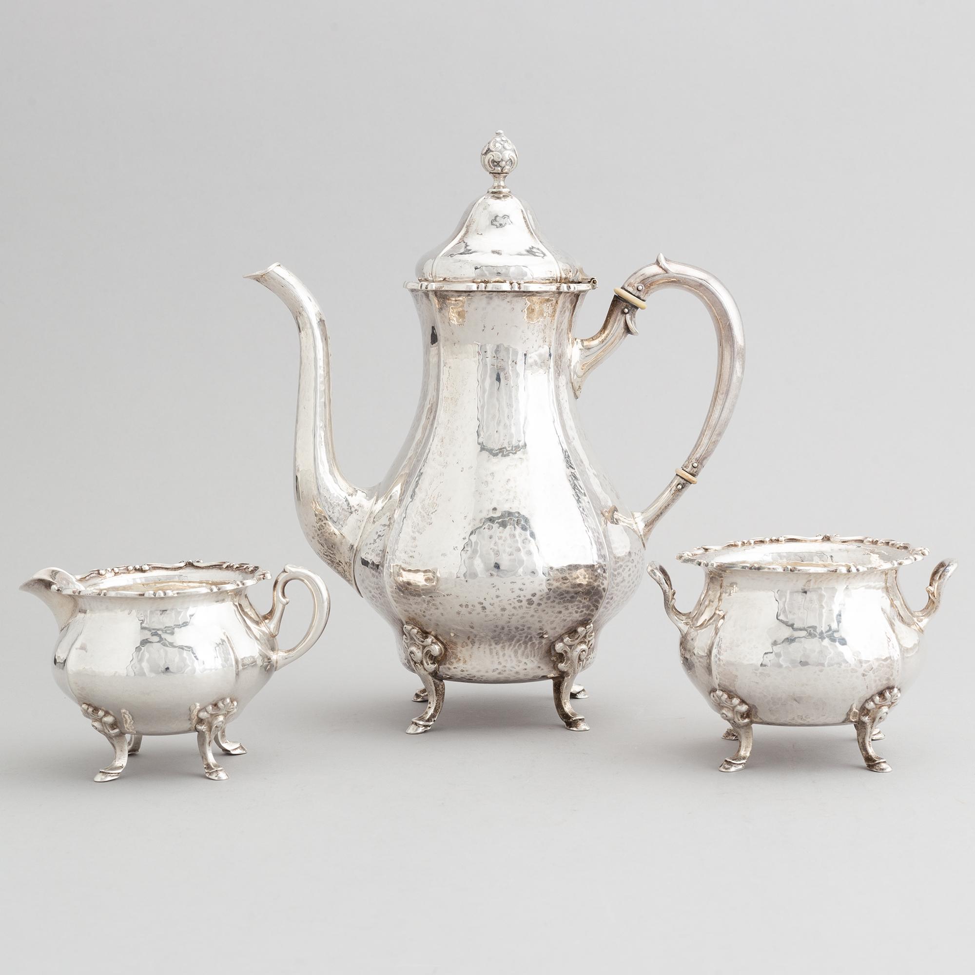 A Swedish rococo-style silver three piece coffee-set, mark of K. Andersson, Stockholm 1928.