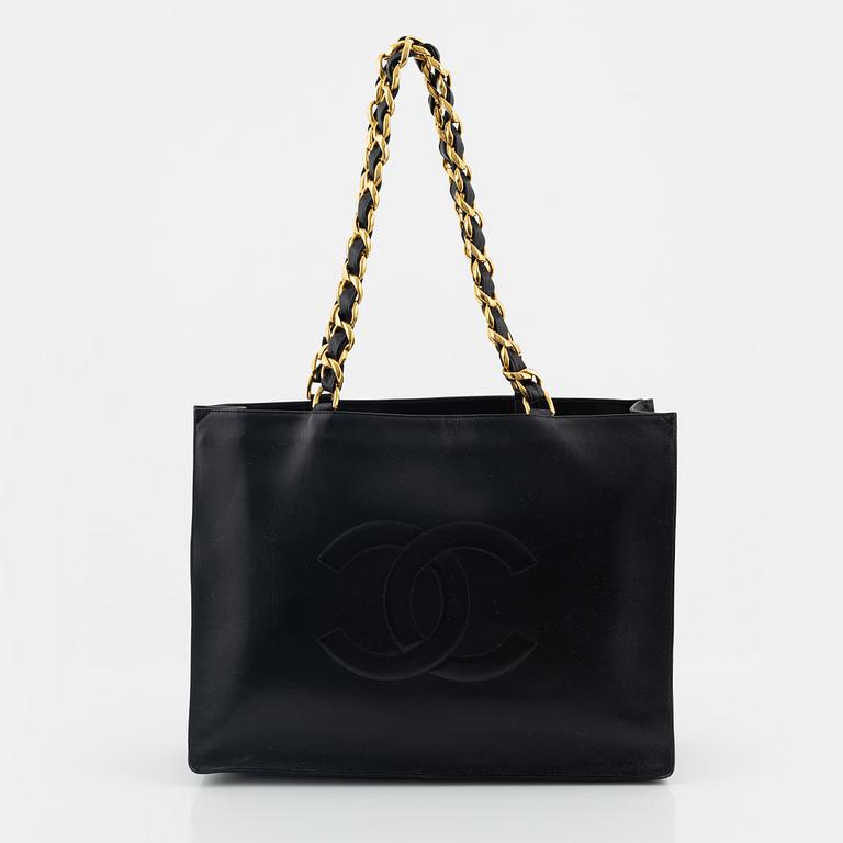 Chanel, a black leather and gold tone chain 'Shopper', 1991-1994.