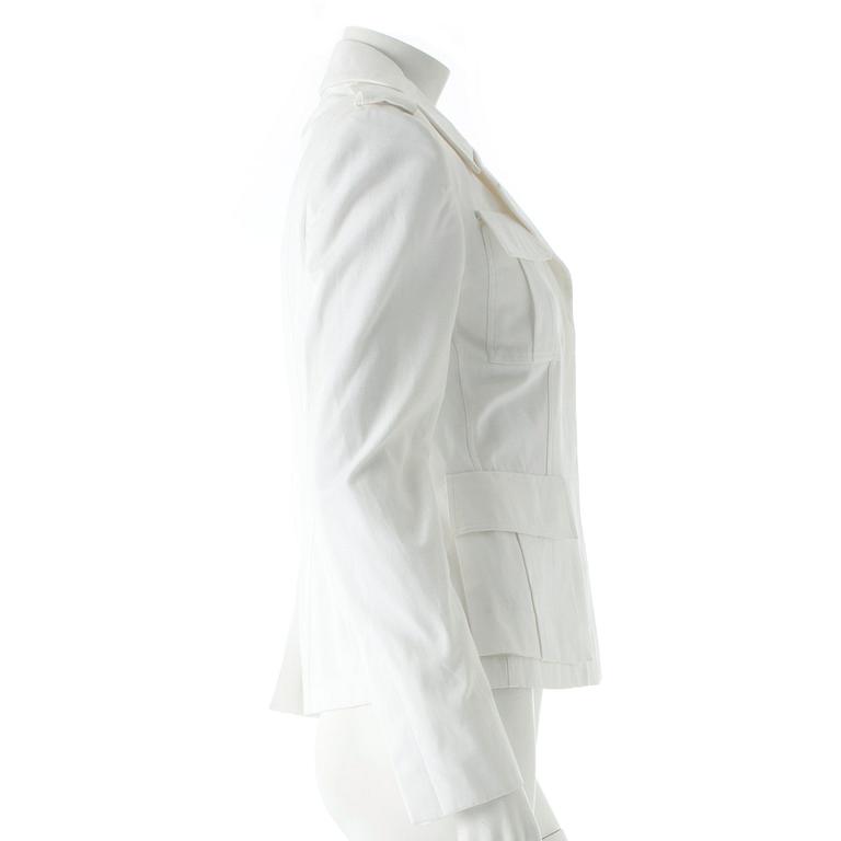 GUCCI, a white jacket.