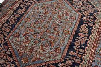 A carpet, semi-antique Hamadan, c. 199 x 128 cm.