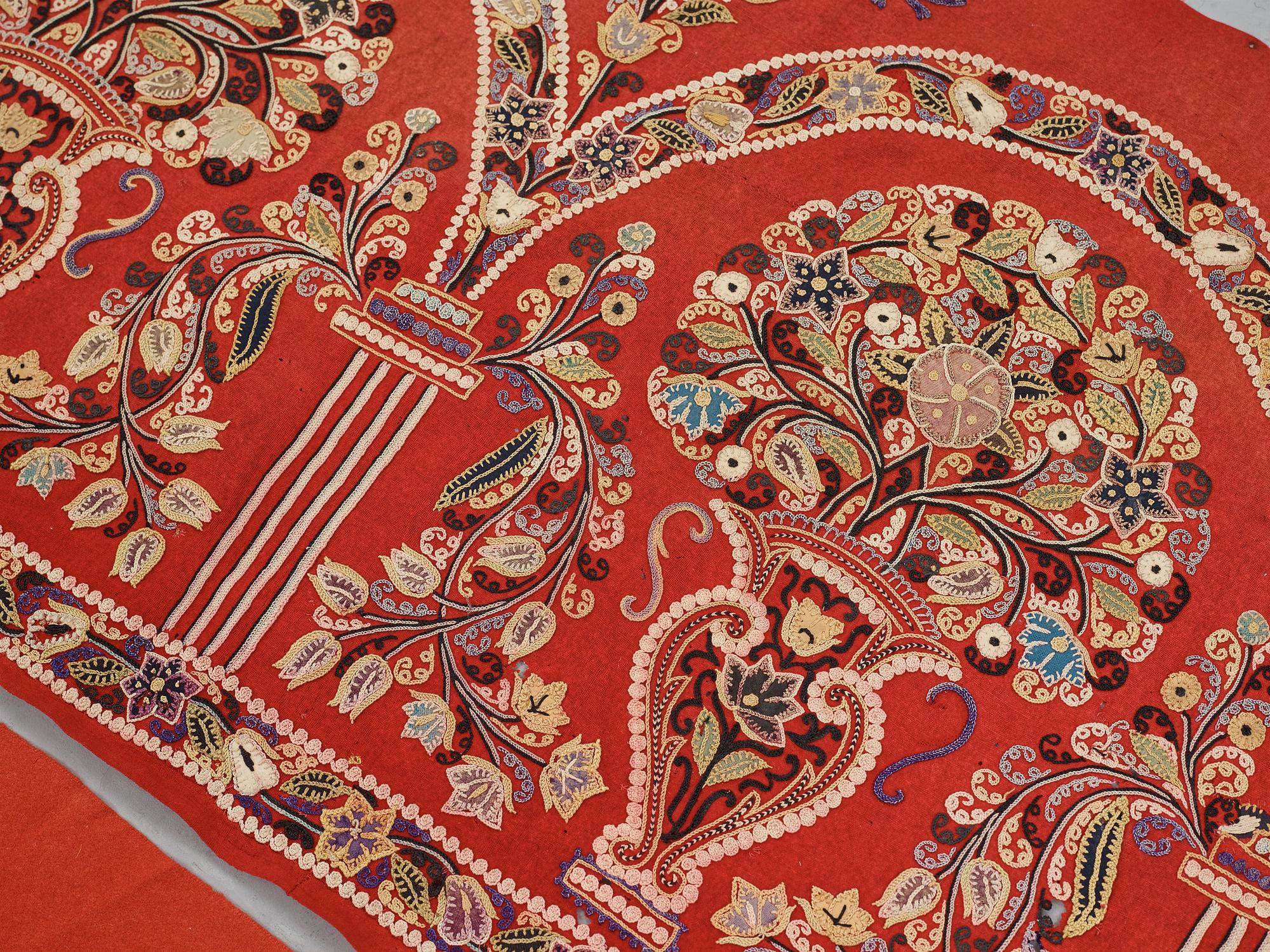 AN EMBROIDERY, antique Rascht, Persia (Iran), late Qajar dynasty, ca  55 - 57,5 x 209,5 - 215 cm.