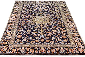 A Kashan carpet, c. 335 x 224 cm.