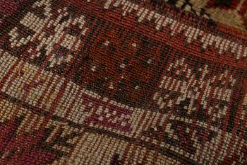 A carpet, antique Avanos, ca 190 x 136 cm (as well as 5 and 6 cm of flat weave on each end.).