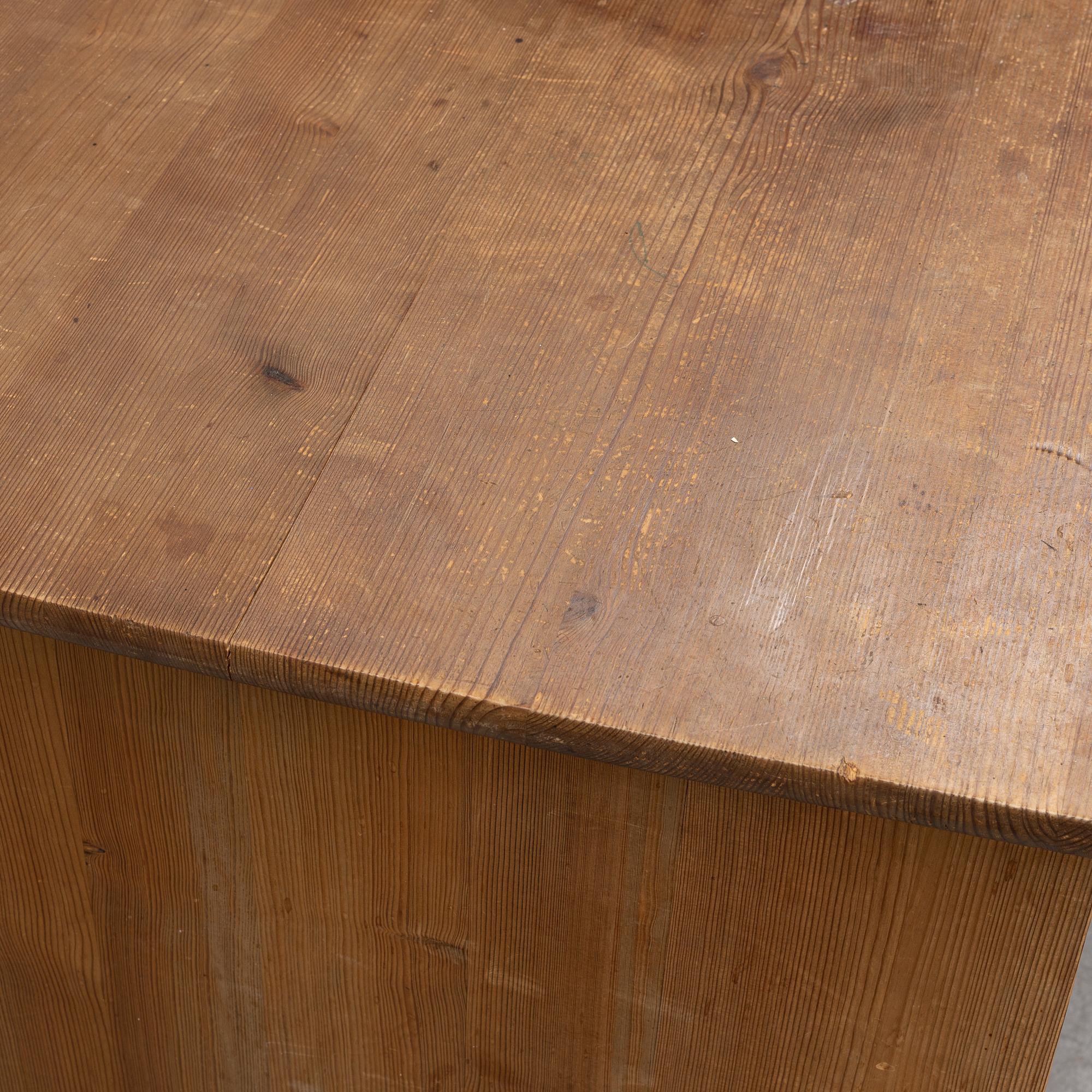 A stained pine writing desk attributed to Carl Westman, early 20th Century.