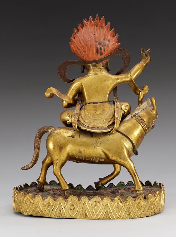 A Sinotibetan gilt metal figure of Palden Lhamo, 18/19th Century.