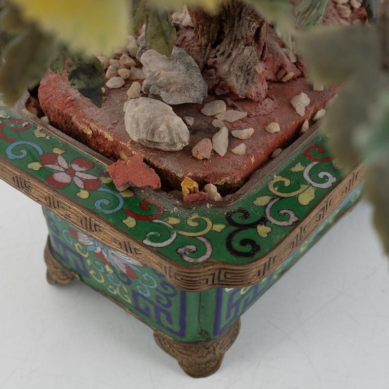 A table decoration, stone and cloisonné, China, second half of the 20th century.