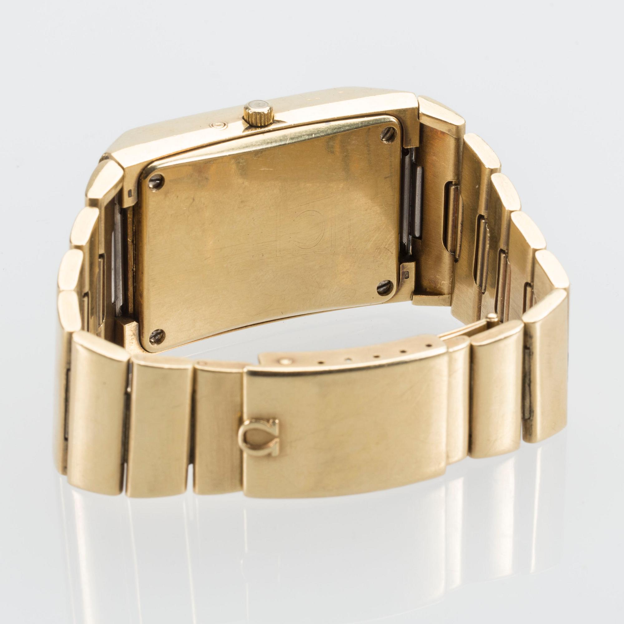 HERRARMBANDSUR, 18 K guld, Omega Constellation  Megaquartz Stardust. Ca 1970-80-tal. Vikt ca 196 g.