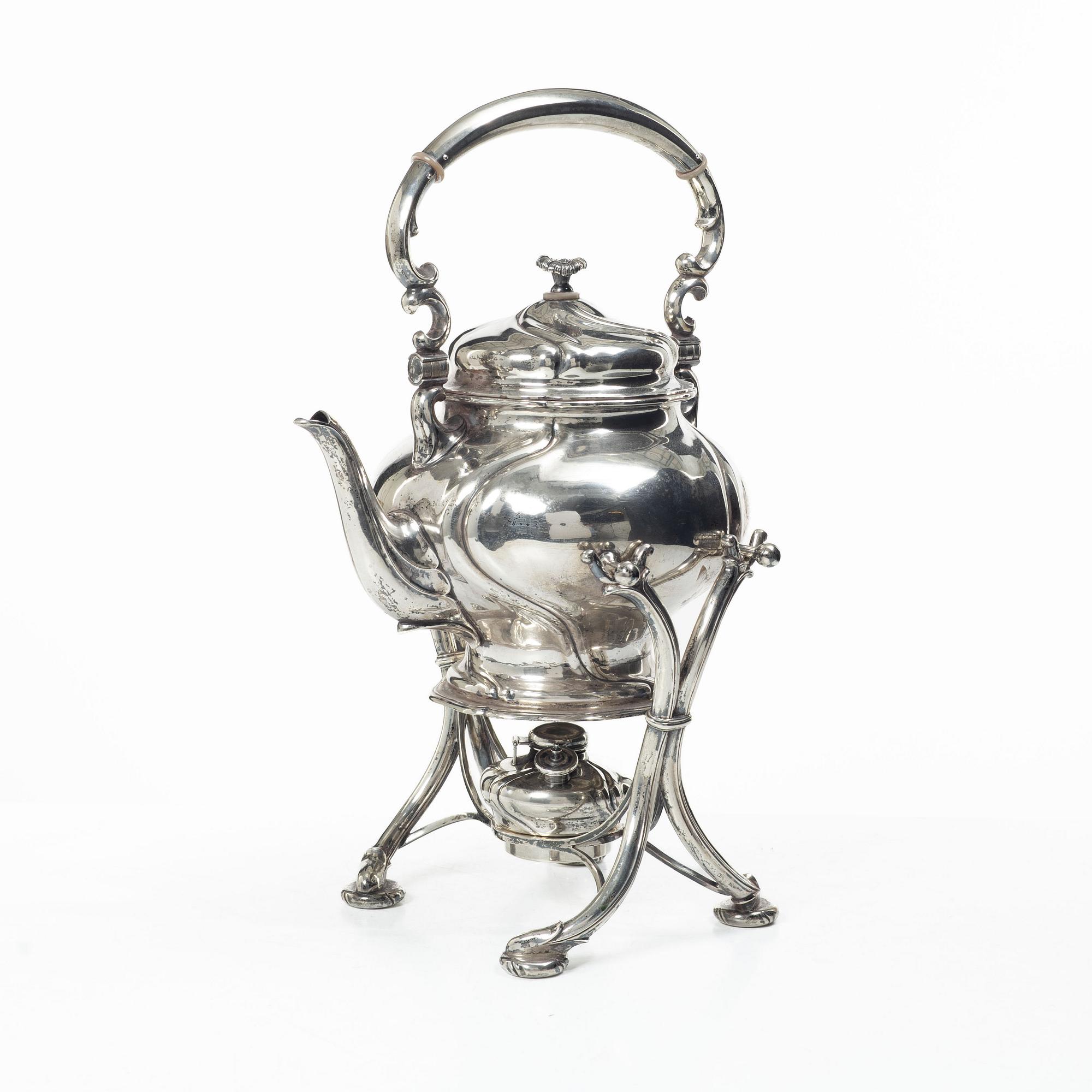 Silver teapot on a réchaud, Rococo style, Swedish import mark CF Carlman, Stockholm 1916.
