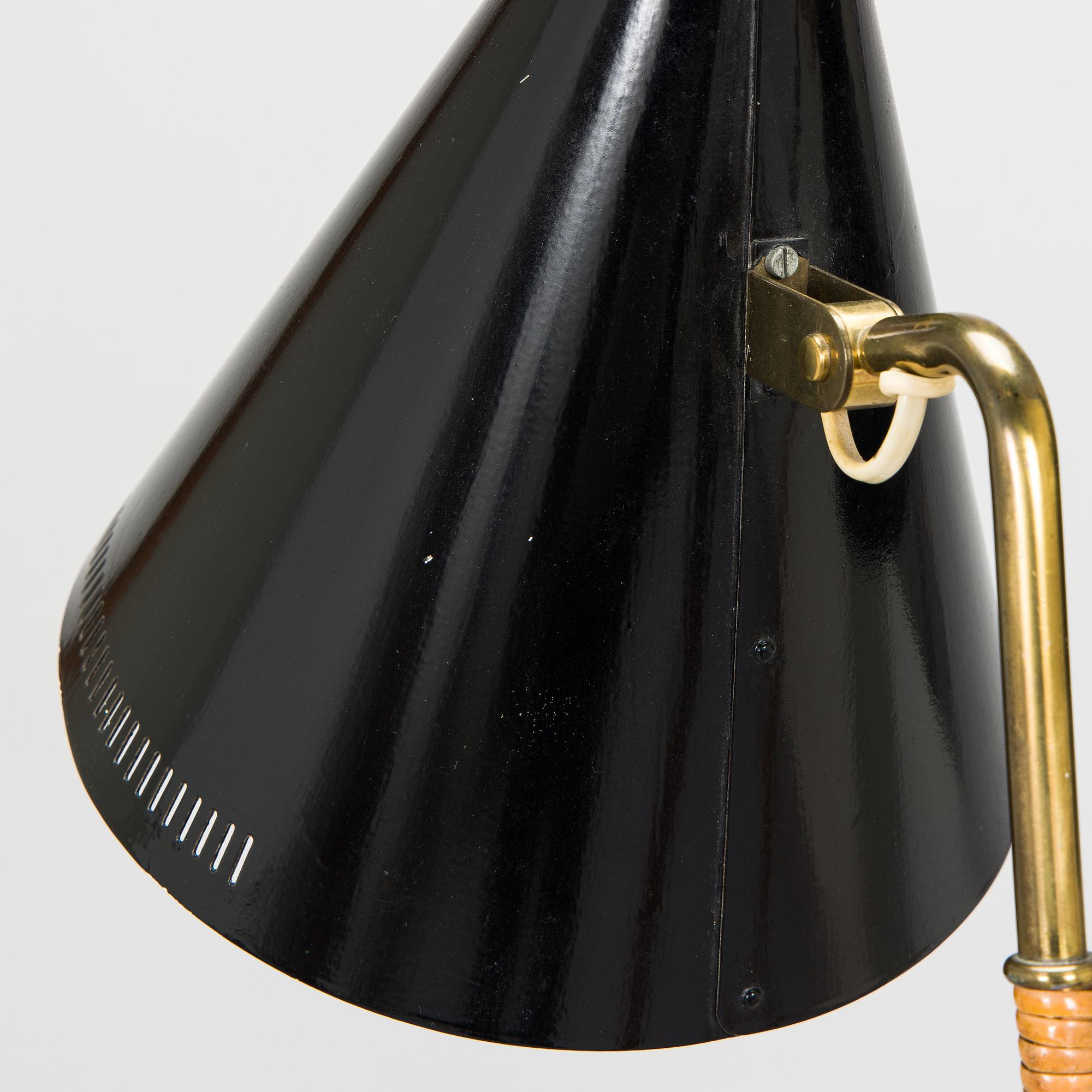 Paavo Tynell, a pair of mid-20th century K10-10 floor lamps for Taito Finland.