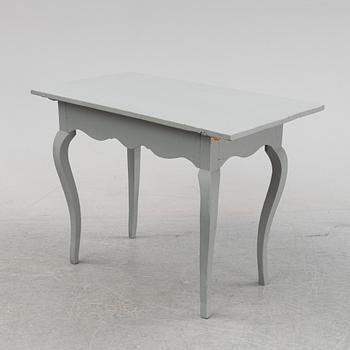 A painted rococo table, 18th Century.