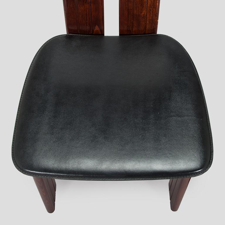 A set of eight dining chairs, Italy.