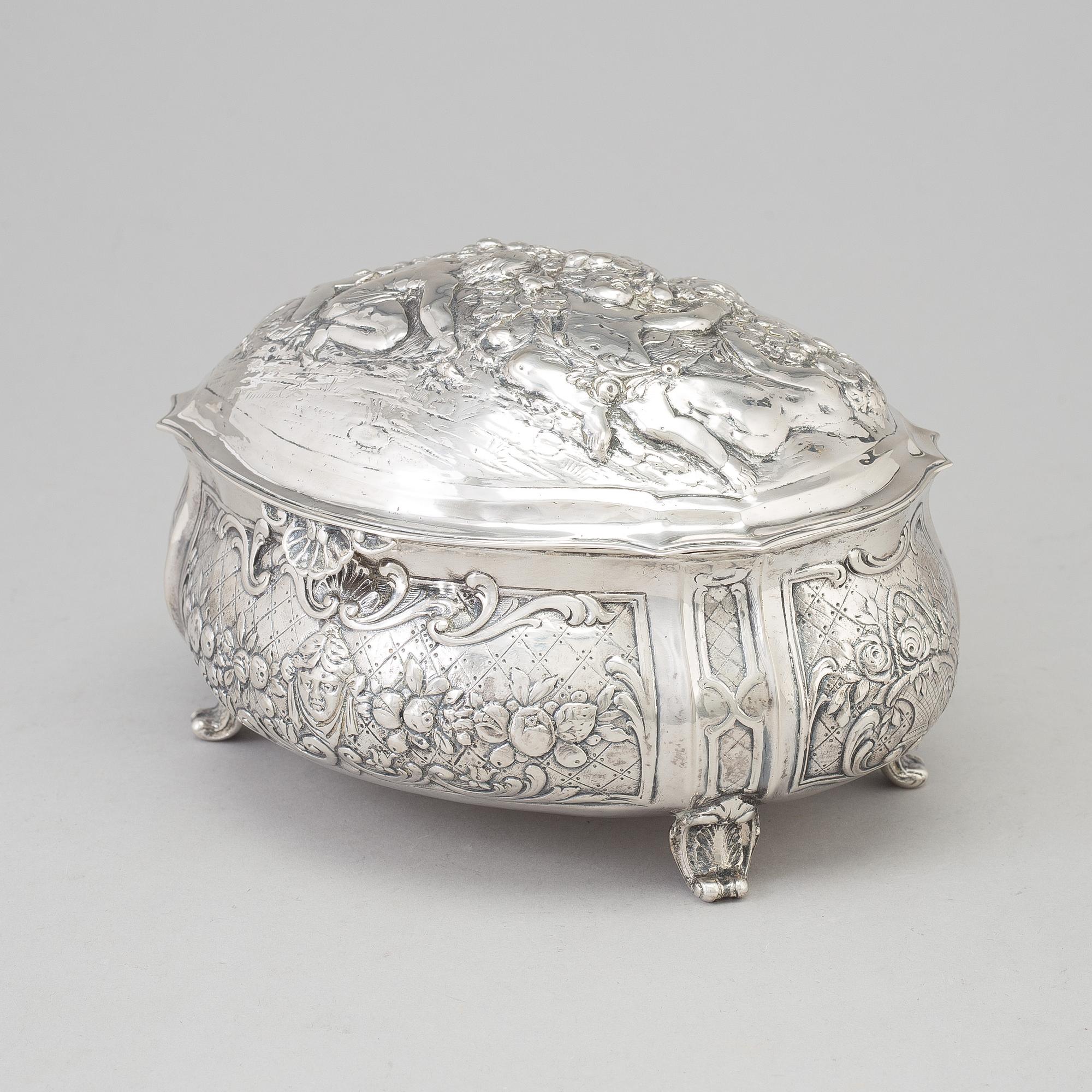 A silver sugar box, early 20th century.