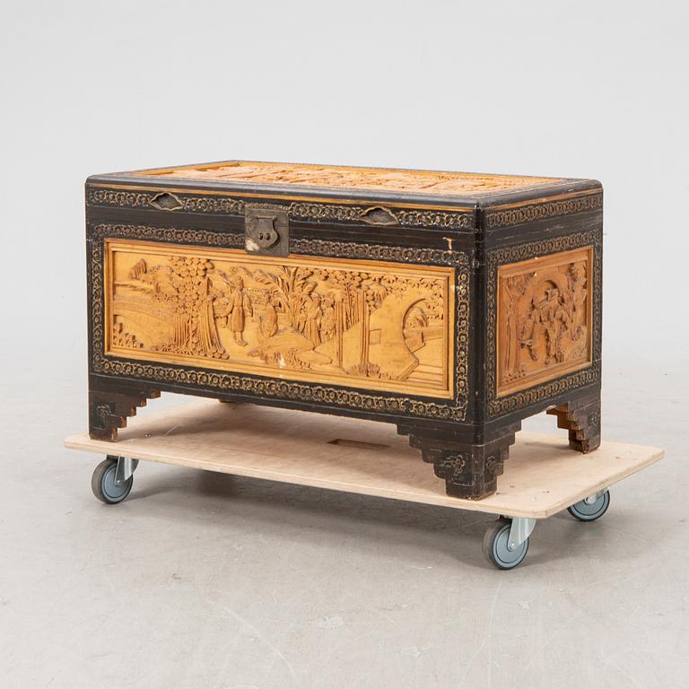 An Asian wooden coffin 20th century.