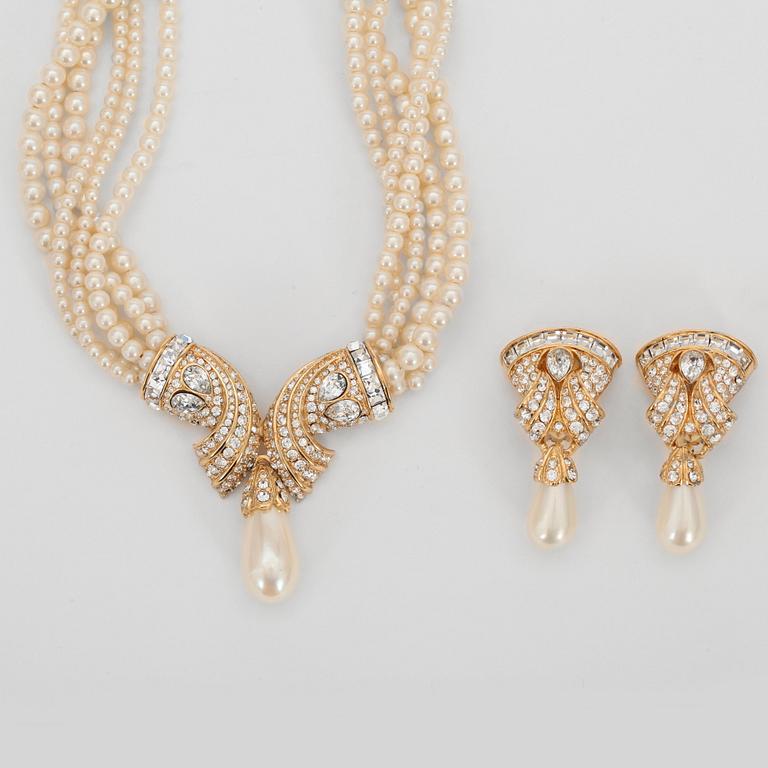 OSCAR DE LA RENTA, a necklace with white decorative pearls and clip earrings.