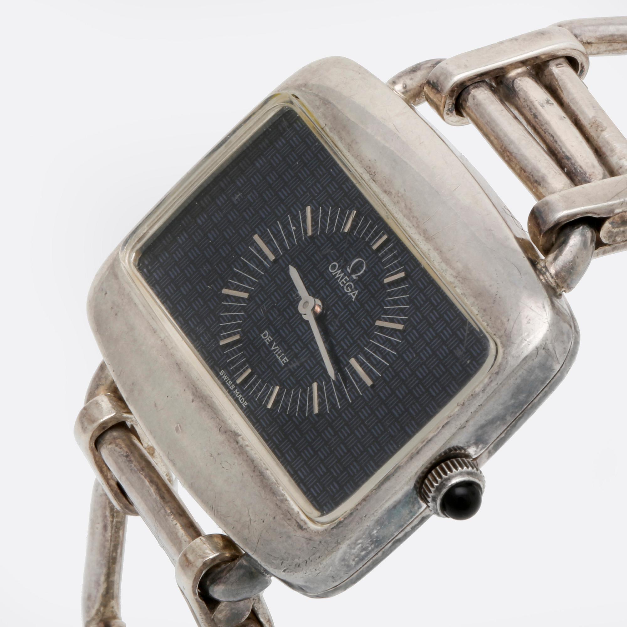 Omega armbandsur, silver, manuell, ca 42 x 30 mm, armband i silver längd ca 20,5 cm.