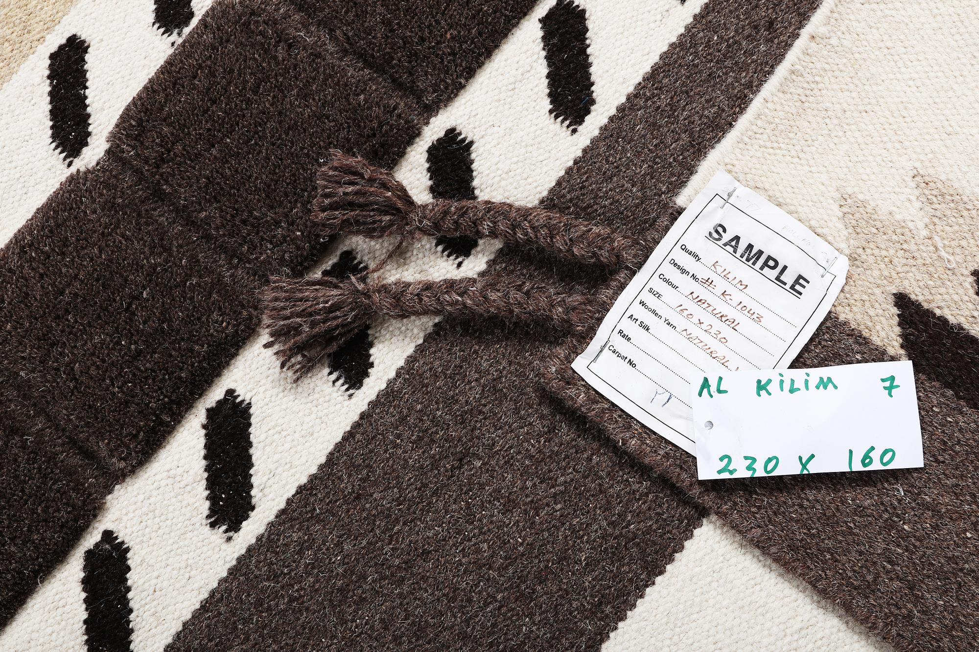 A Kilim rug, c. 230 x 160 cm.