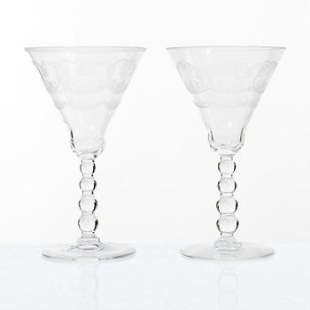 Simon Gate, twelve 'Molnet' white wine glasses, Orrefors.