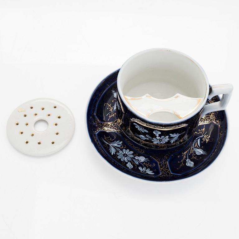 A set of 24 pair of porcelain mustache cups, including Germany, 19th and 20th century.