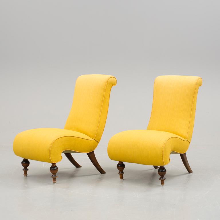 A pair of neo-renaissance easy chairs late 19th century.