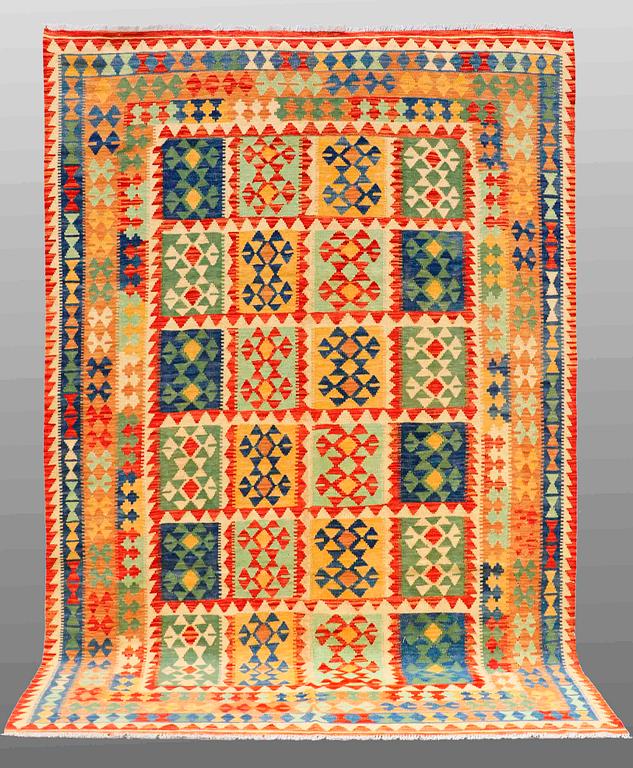 A carpet, Kilim, ca 306 x 201 cm.