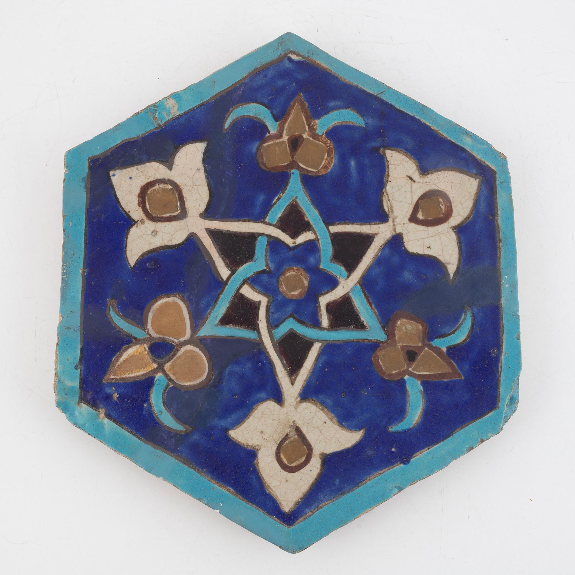 A glazed earthenware tile, Qajar dynasty Persia (Iran), 19th Century.