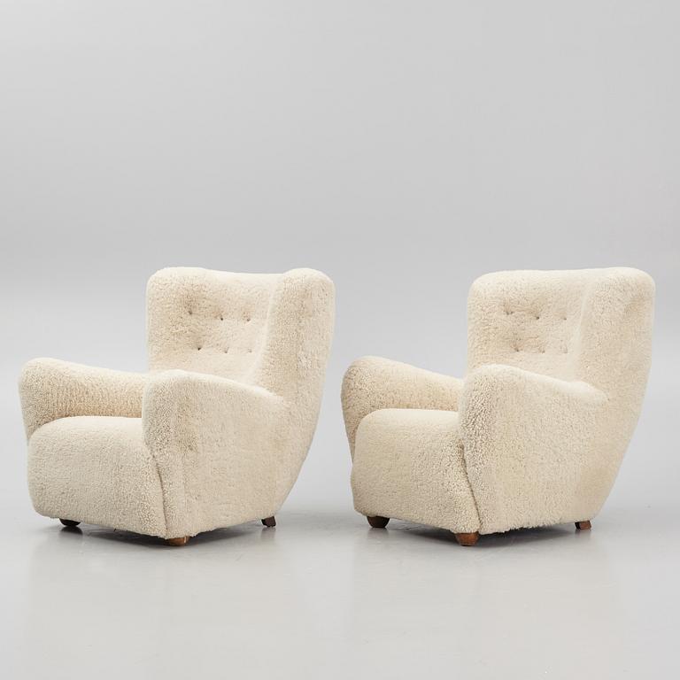 A pair of Danish Modern sheepskin armchairs, 1930's/40's.
