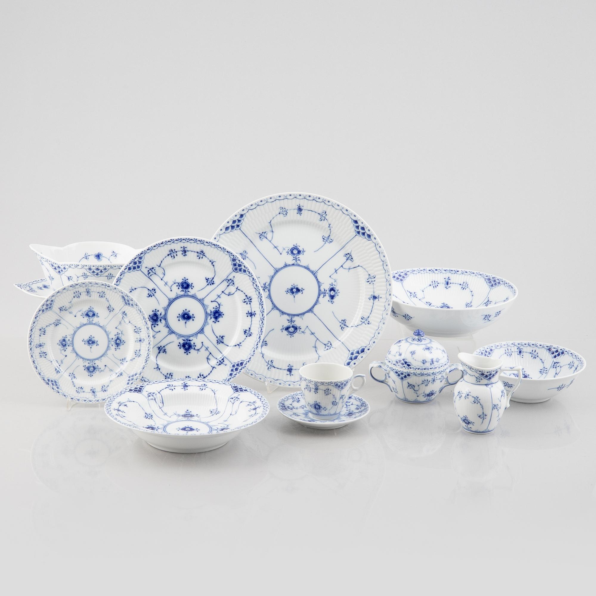 An 80-piece 'Blue Fluted' porcelain dinner and coffee service, Royal Copenhagen, Denmark.