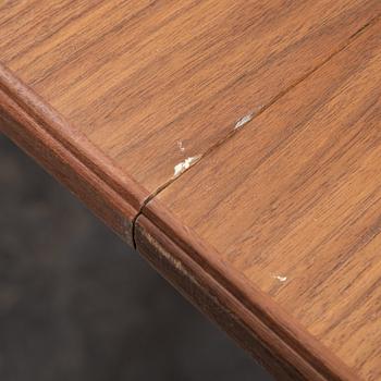 Carl Malmsten, A five-piece walnut 'Ambassadör' dining suite by Carl Malmsten.