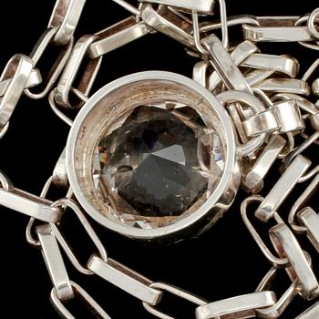 HÄNGE, sterlingsilver med fasettslipad bergkristall, anders Högberg, Göteborg, 1995. Vikt 52 g.