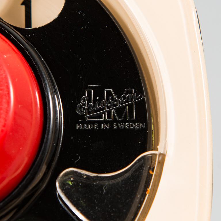 An interior set in red plastic from the 1970s, 7 parts.