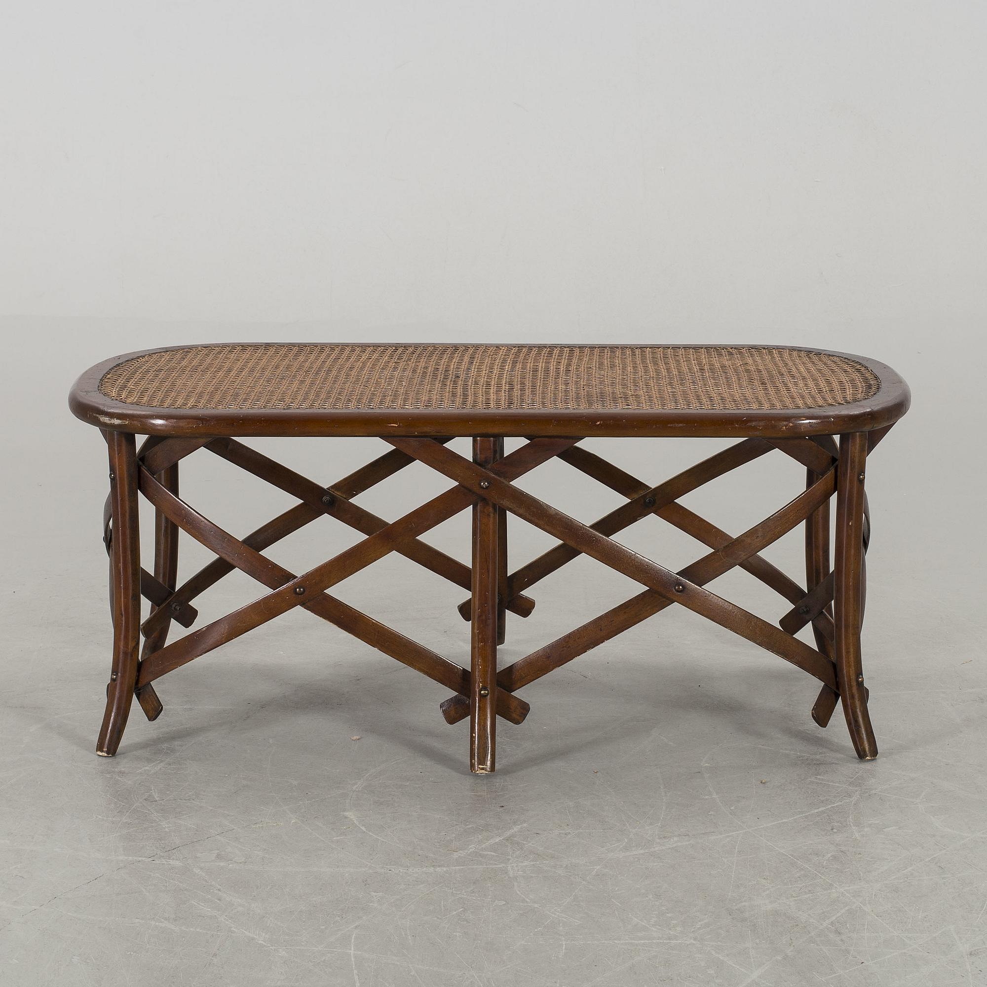 A wooden sofa, a table and four chairs, later part of the 20th century.