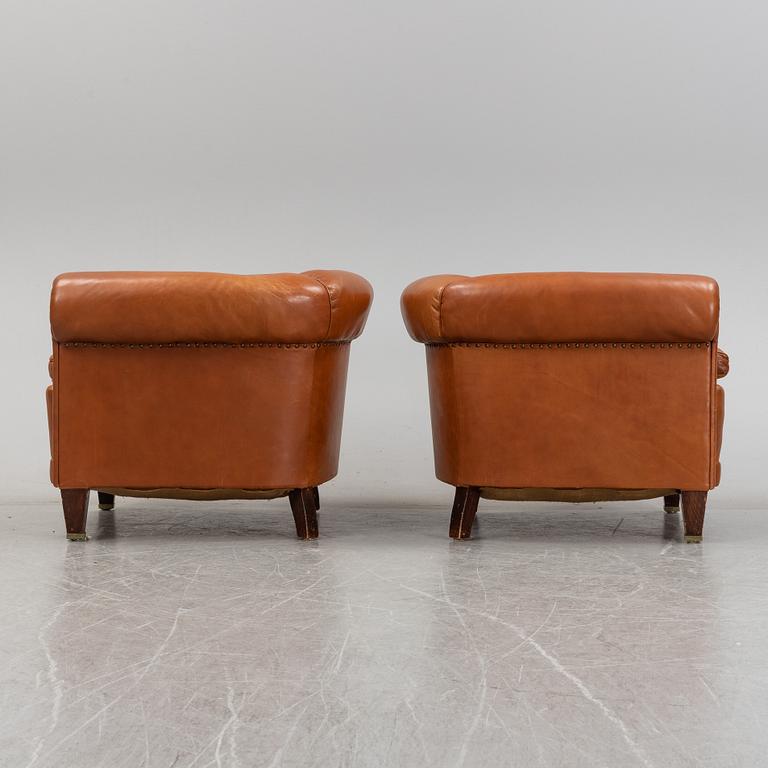 A pair of leather upholstered club chairs, 1930/40's.