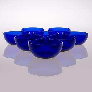 A set of 22 glass dessert bowls in three colours, Iittala, Finland, late 20th century.