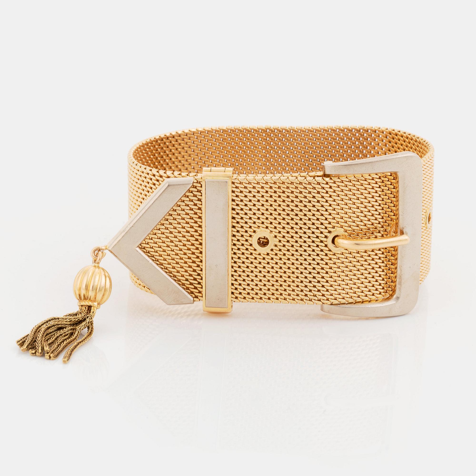 An 18K gold bracelet.