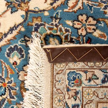 An old Nain carpet ca 359x248 cm.