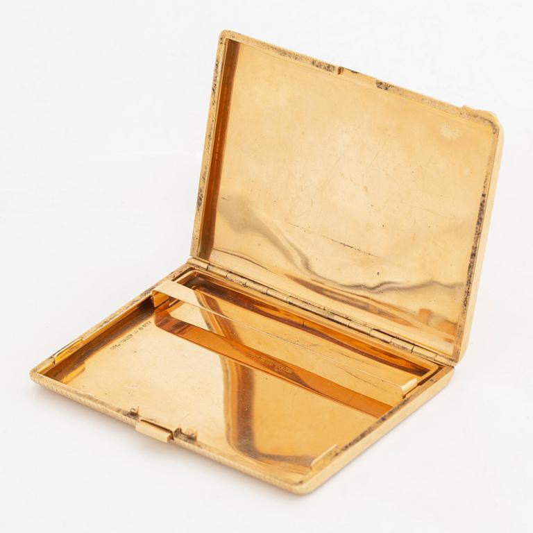 18K gold cigarette case.