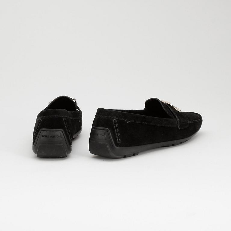 LOUIS VUITTON, apair of black suede loafers.