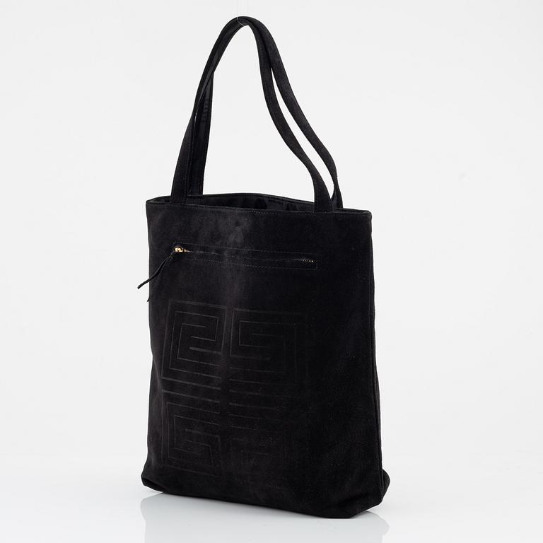 Givenchy, a black suede tote bag.