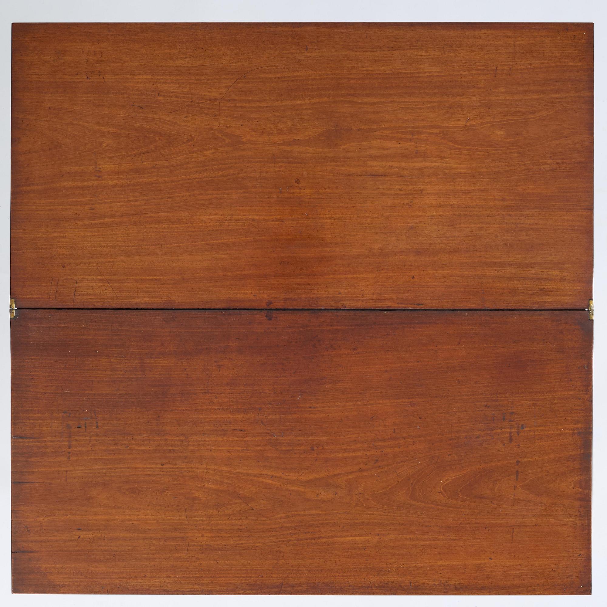 A late Gustavian mahogany cards table, Stockholm, late 18th century.