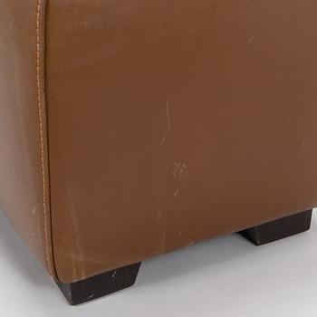 A leather-upholstered bench from Industria Divani e Poltrone, Italy.