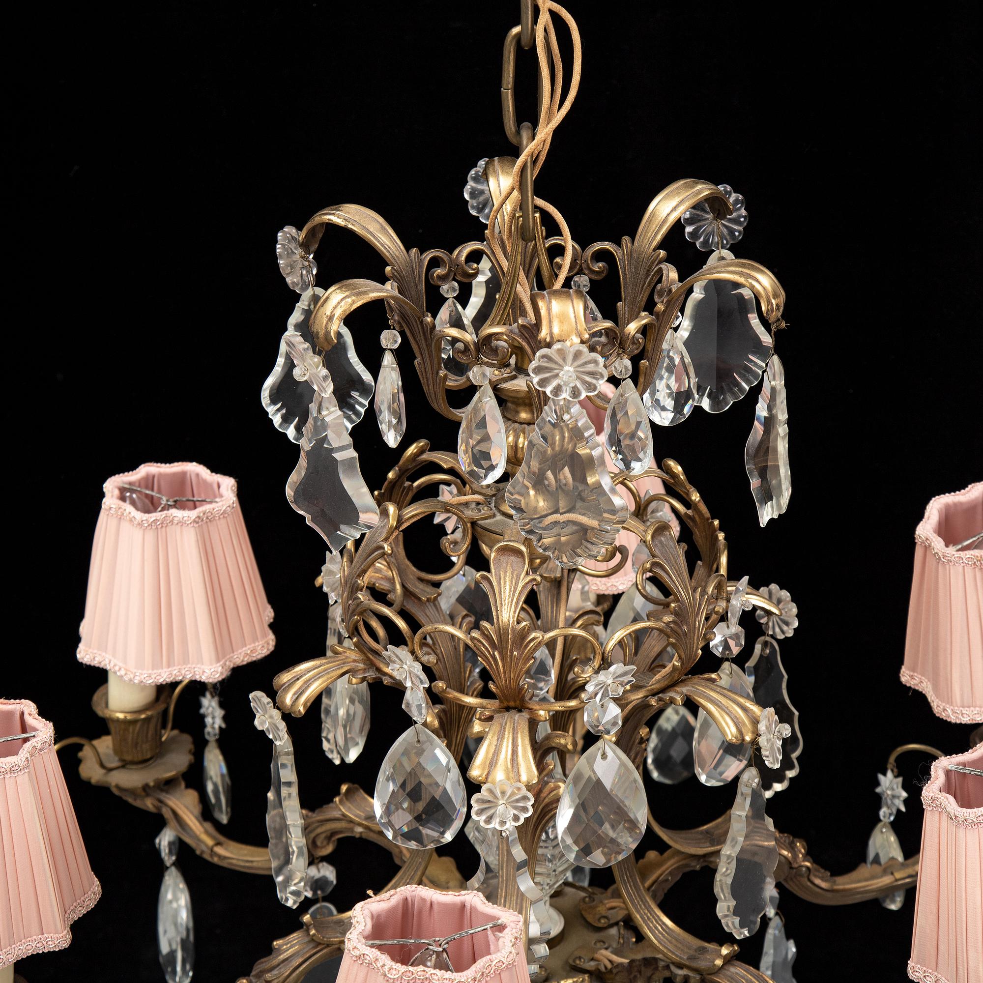 A brass and glass chandelier.