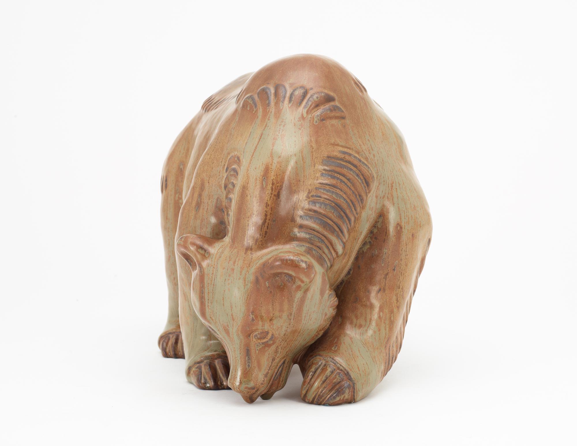 A Gunnar Nylund stoneware figure of a bear, Rörstrand.