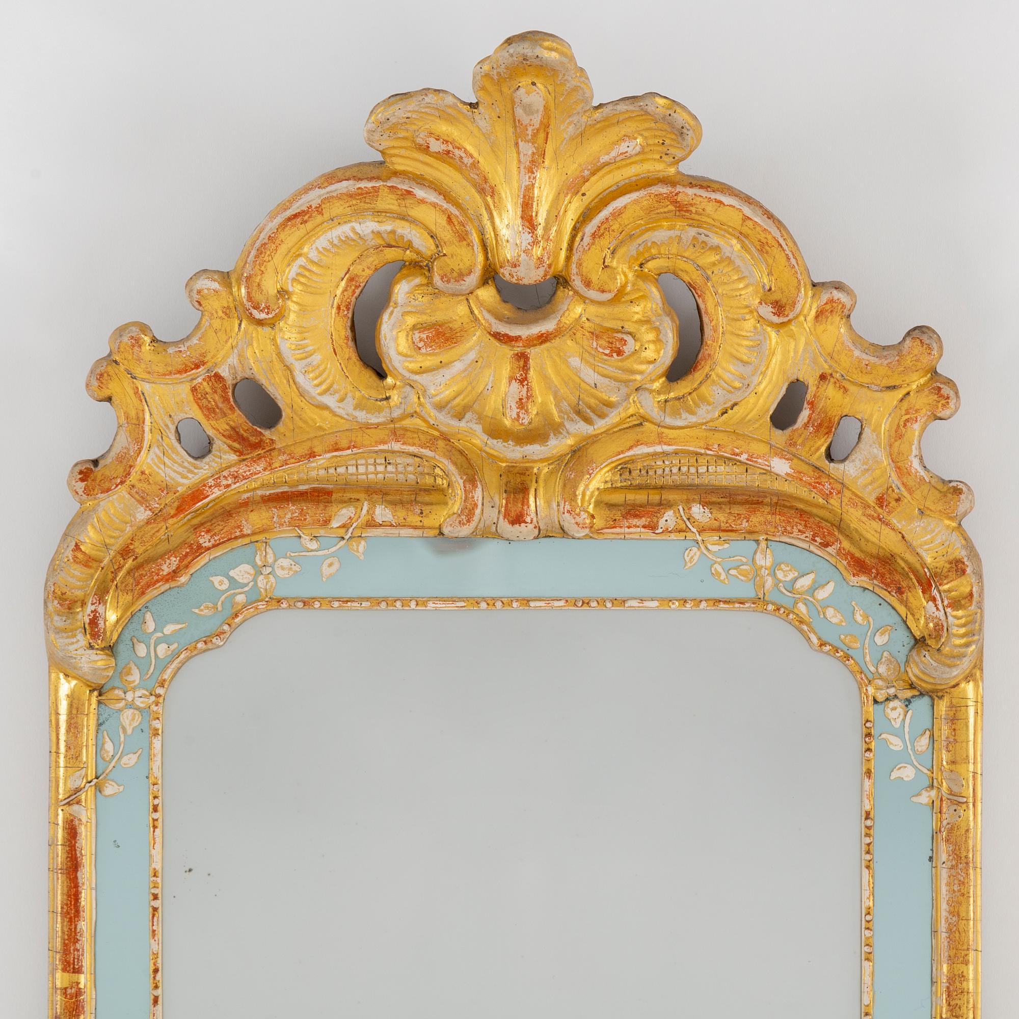A rococo mirror by Niclas Meunier (1754-1797).