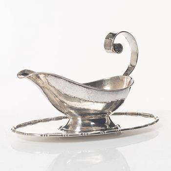 A Swedish silver sauce boat, marks of C.G. Hallberg, Stockholm 1926.
