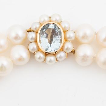 Pearl necklace, double-stranded with cultured freshwater pearls, clasp 18K gold set with aquamarine and cultured pearls, Jarl Sandin.