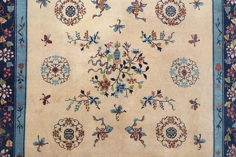 A semi-antique carpet, China, c. 350 x 275 cm.